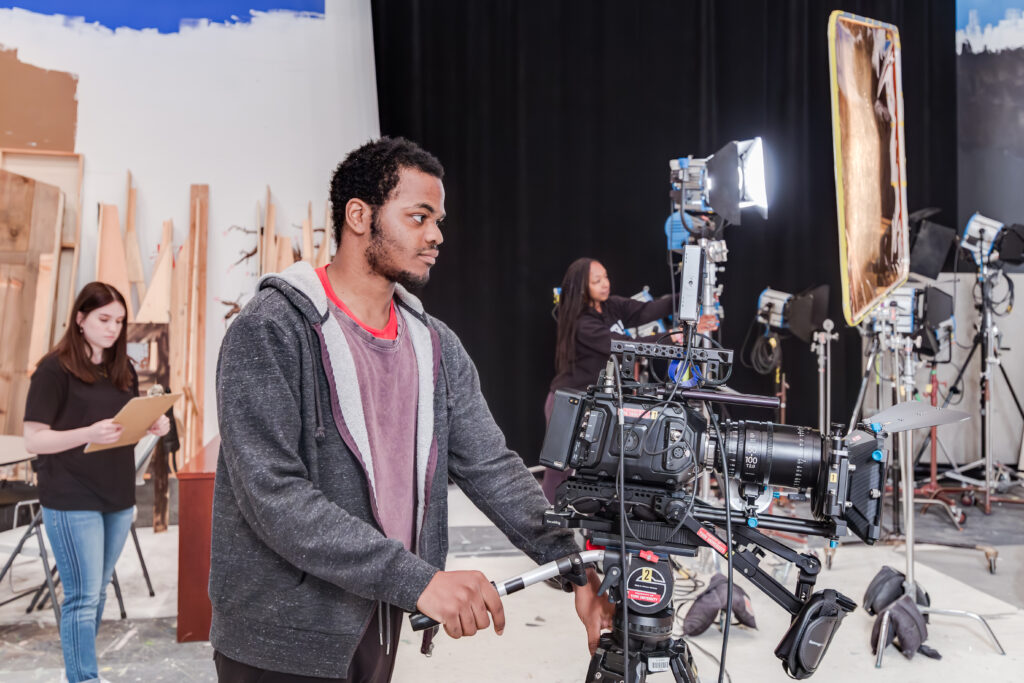 student filming a movie 