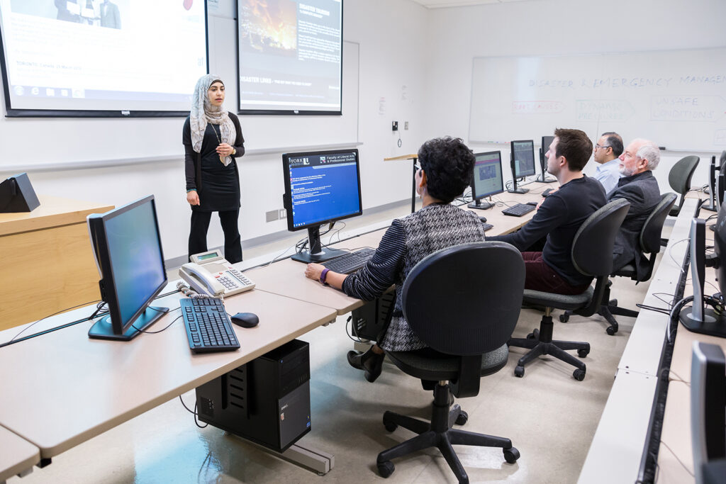 students learning in a computer workshop